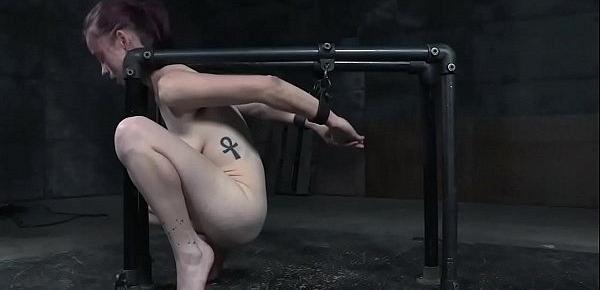  Restrained submissive tormented with toys